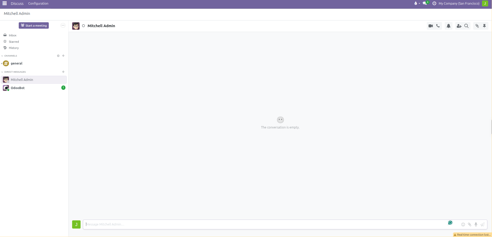 Direct message conversation window showing colleague status, top toolbar actions, and composer